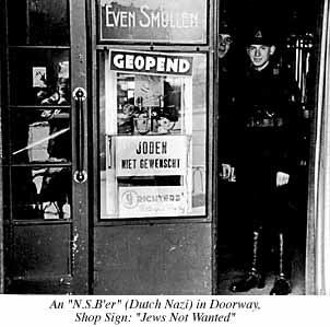 Photograph of N.S.B'er (Dutch Nazi) in doorway. Shop sign: Jews Not Wanted