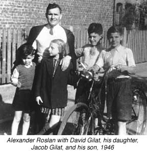 Photograph of Alexander Roslan, David Gilat, Roslan's daughter, Jacob Gilat and Roslan's son, c.1946