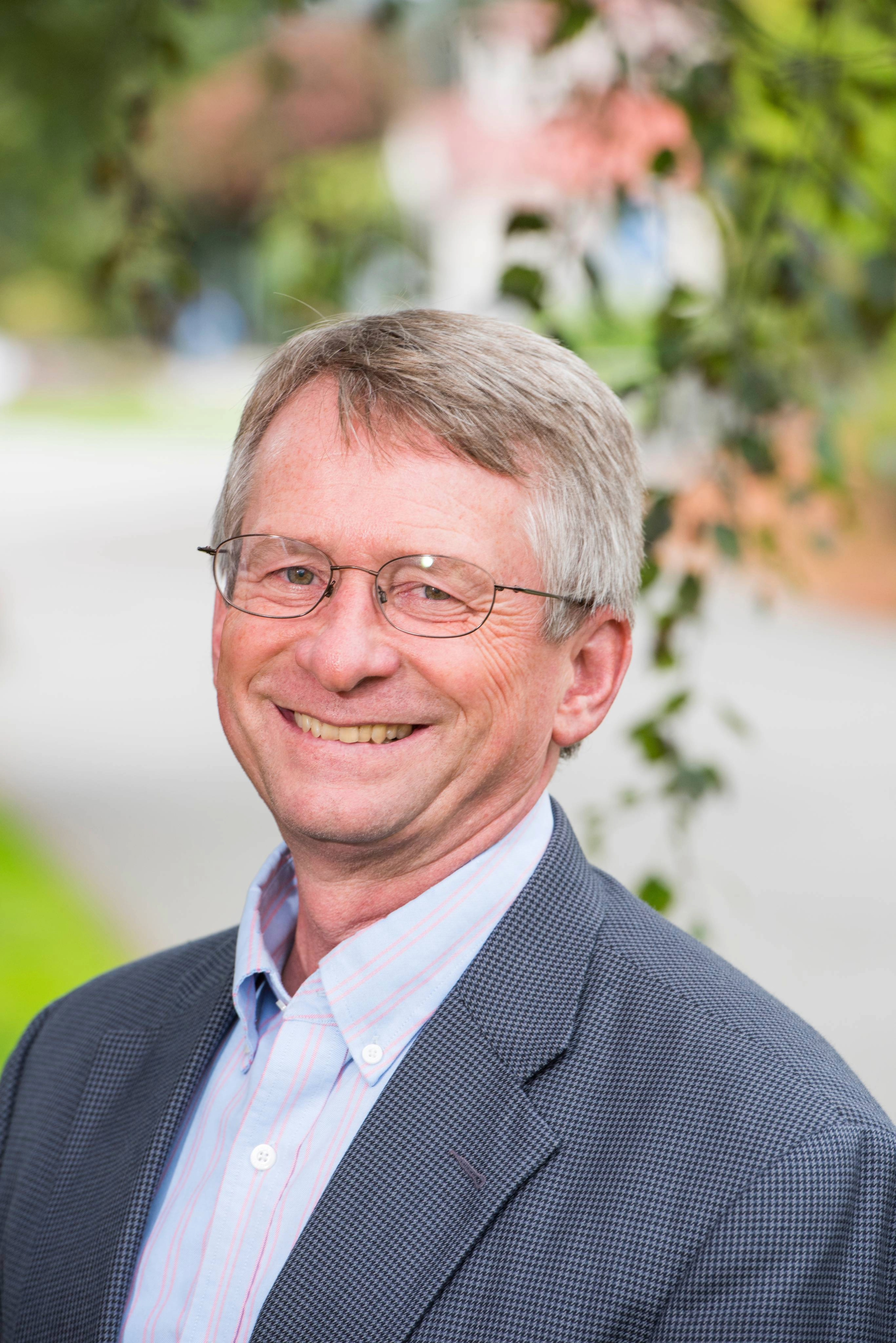 Professional headshot of Dale Oliver