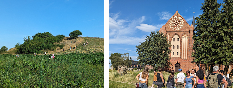 Grassy field with plateau, and people standing in front of an old church