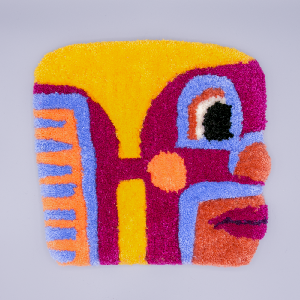 Photograph of hooked rug luchador