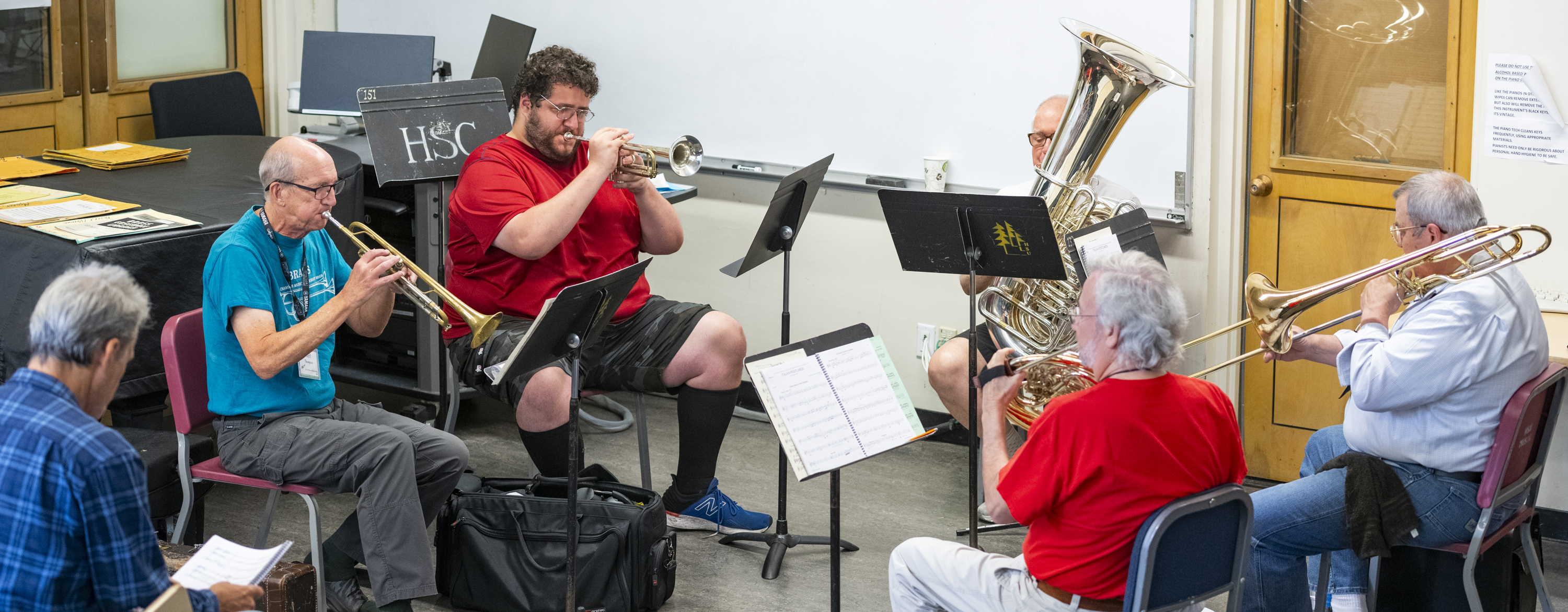 Brass players in classroom