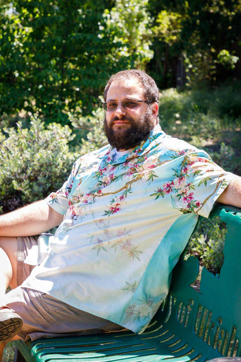 Michael Curl sitting on a bench