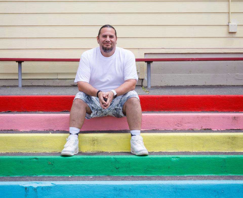 Pliny McCovey sitting on steps