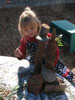 Child playing with rocks