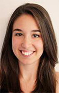 Hannah closeup portrait, dark brown hair and a big smile