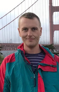 Caleb standing in front of the golden gate bridge