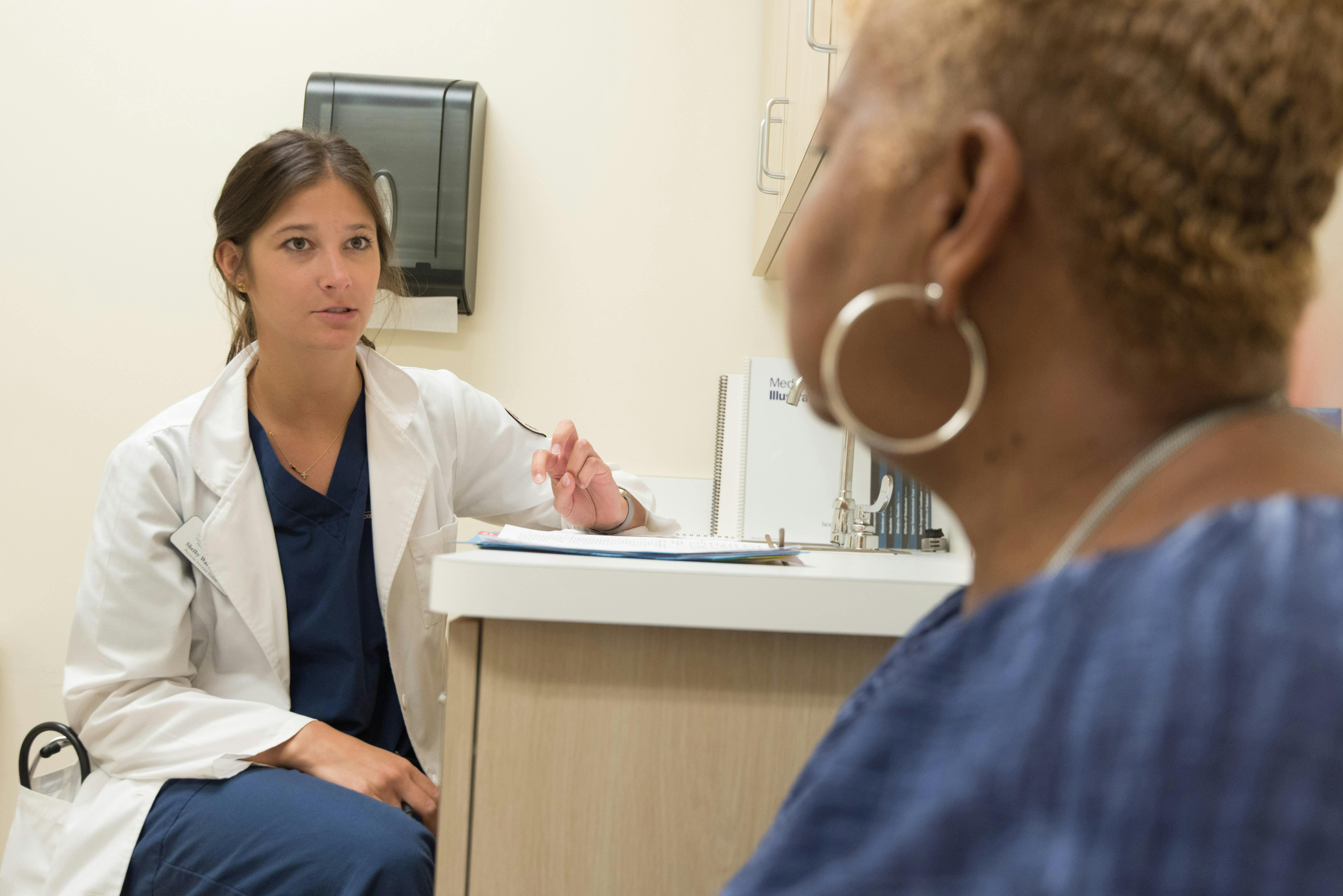 Doctor and patient talking