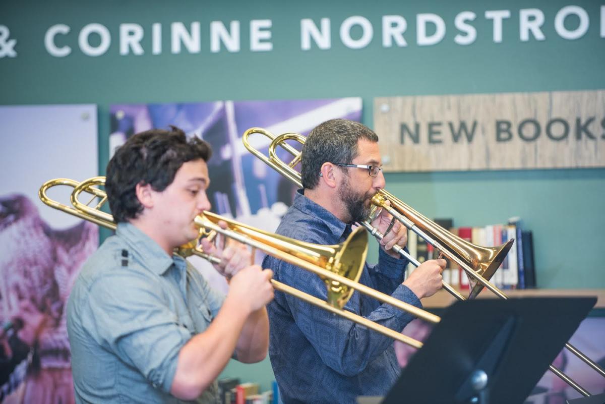 Musicians playing trombones