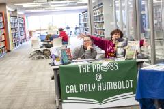 photo of students at Press table