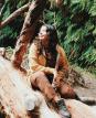 Zaida portrait. Sitting on a large tree stump