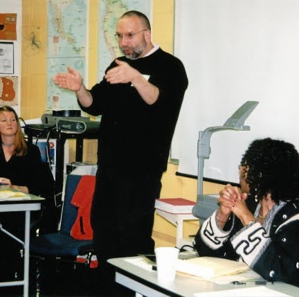 Eric Rofes teaching in a classroom.