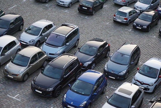 Parking lot with rows of cars
