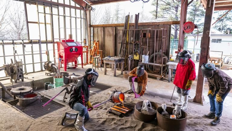 Students working in a sculpture lab