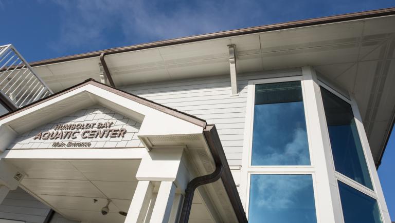 A building with a sign that says Humboldt Bay Aquatic Center. 