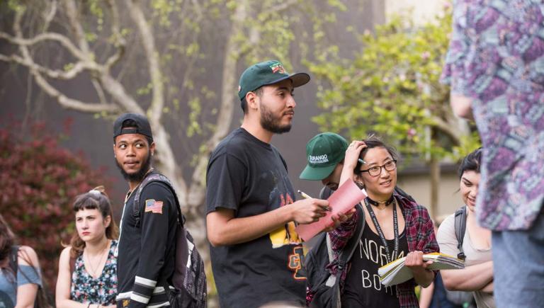 Communication students meeting outside