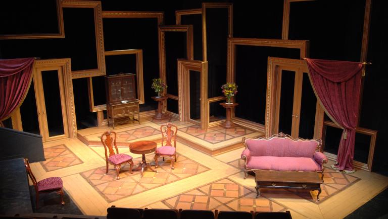 A theatre with a simple furniture setup