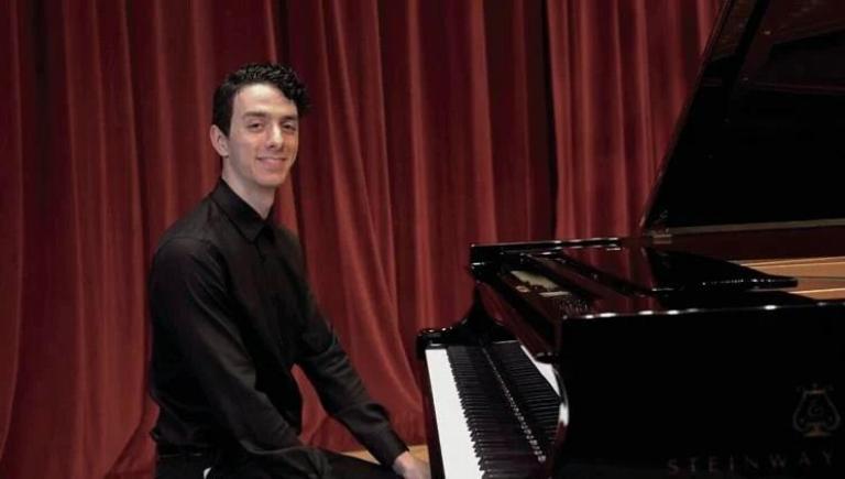 Man sitting at a piano