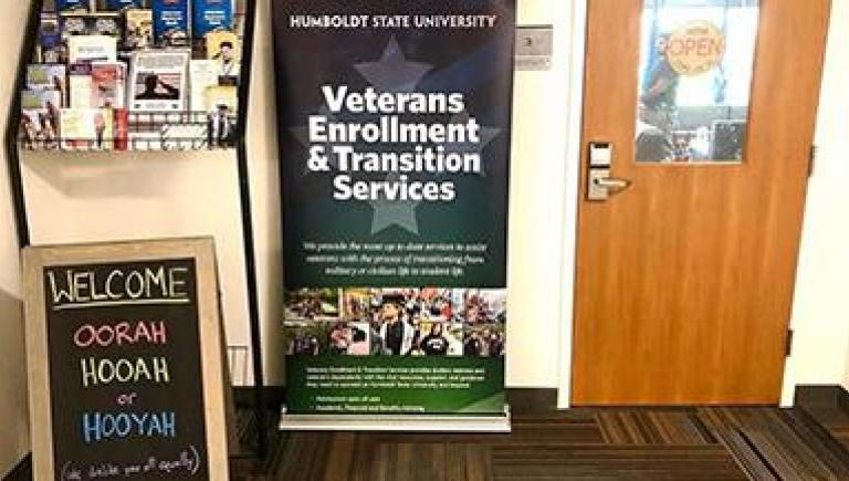 image of VETS office door and signs