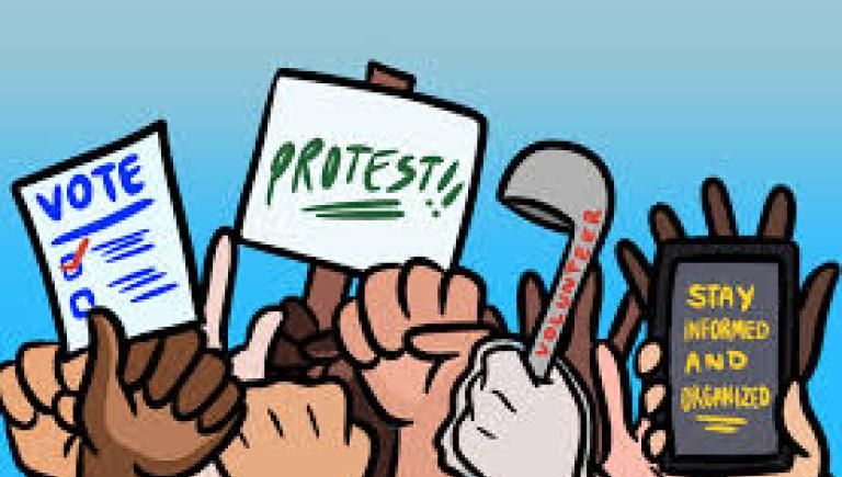 Human hands and protest signs 