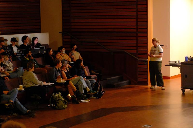 Chef Sara on the right side in the Native American Forum giving her Book Talk to an audiance on the left side.