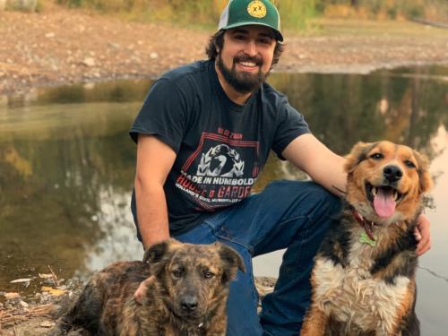 Austin Rhodes with his two dogs