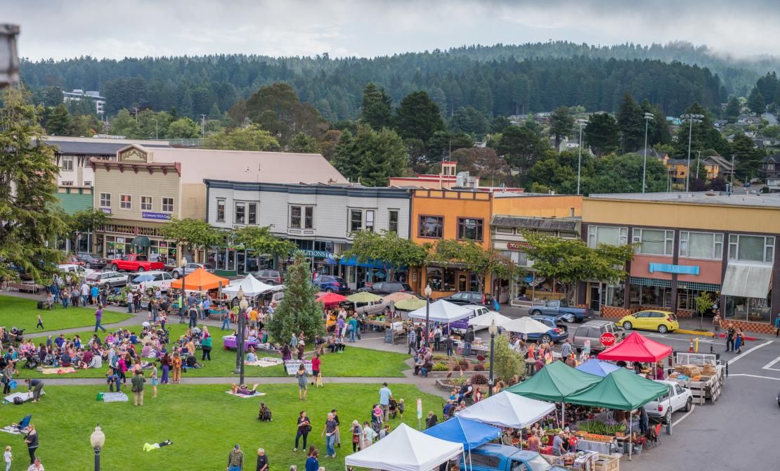 A scene from the Farmers' Market in downtown Arcata with vendor tents