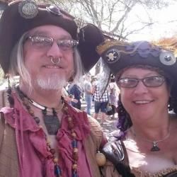 Two people in pirate-like regalia