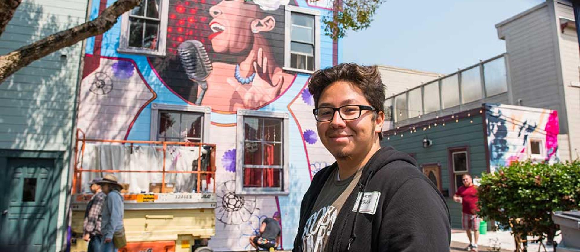 Humboldt students enjoying mural at during the Eureka Street Art Festival