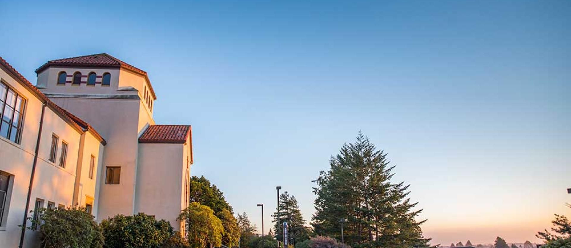 Sun setting on Founders Hall