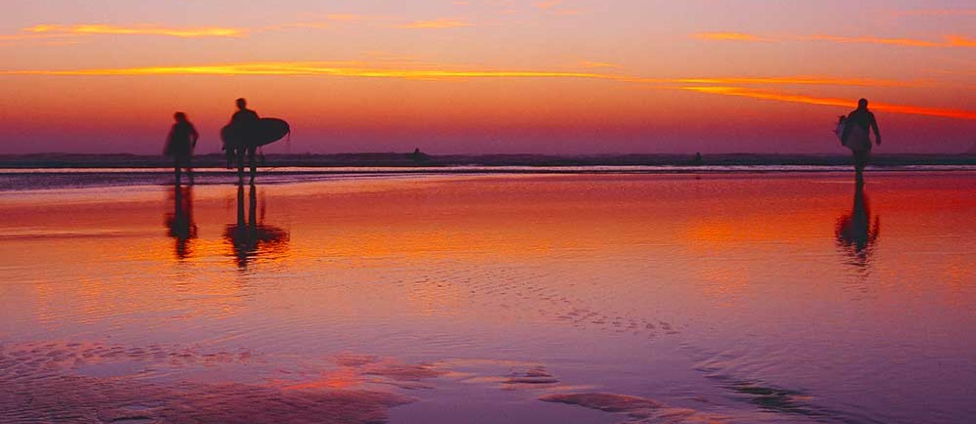 Surfers at sunset, Moonstone Beach