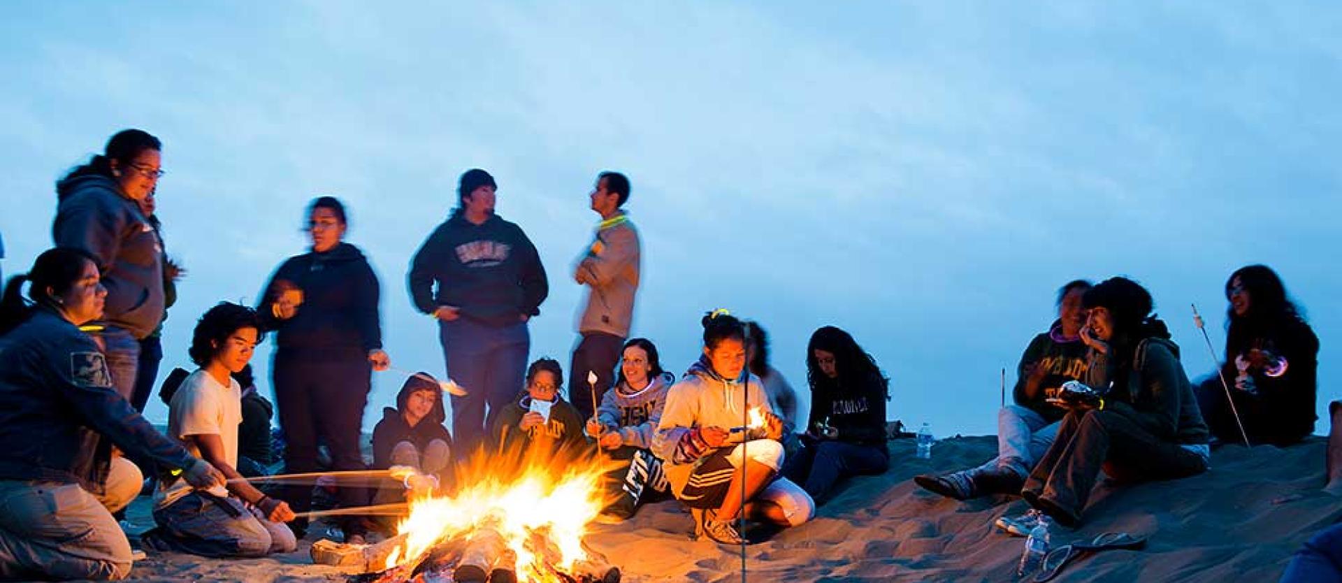 Roasting marshmallows at Clam Beach