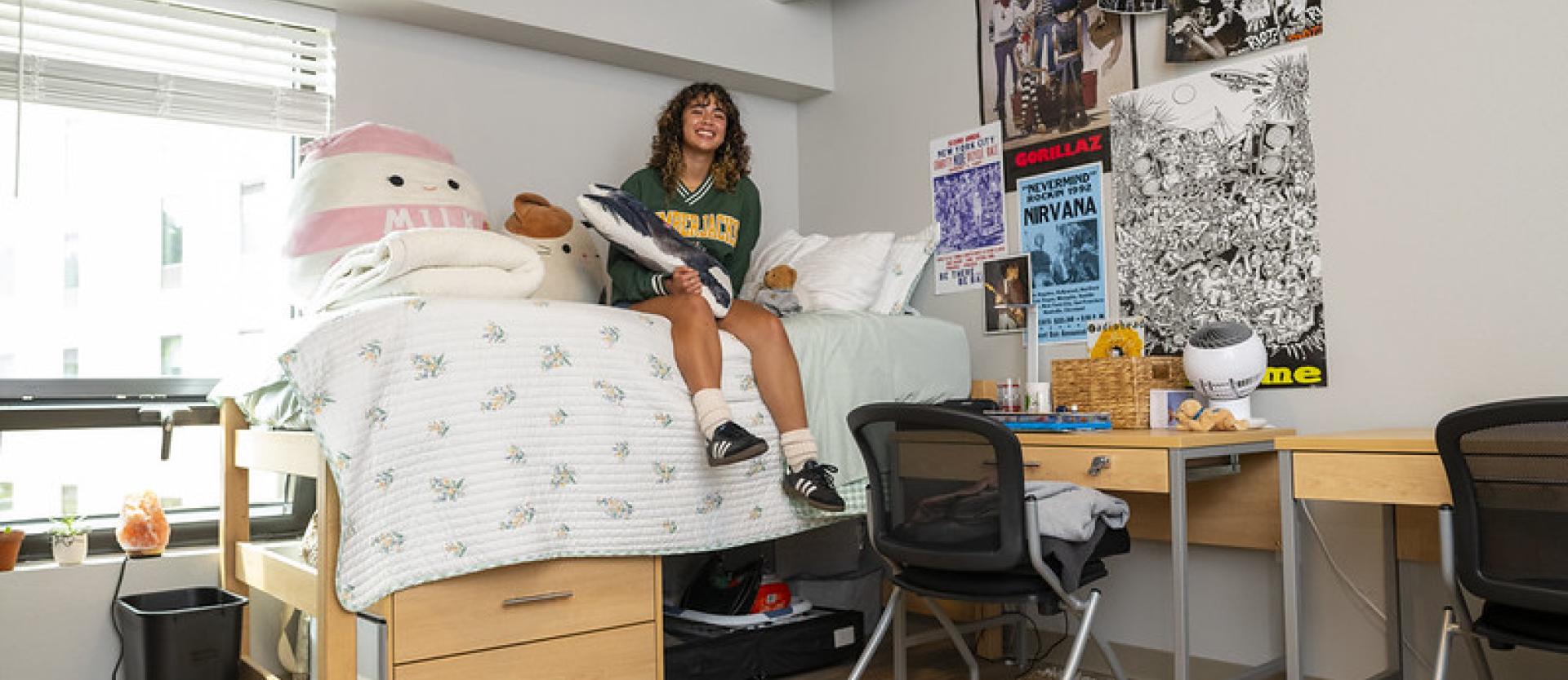 student in dorm room
