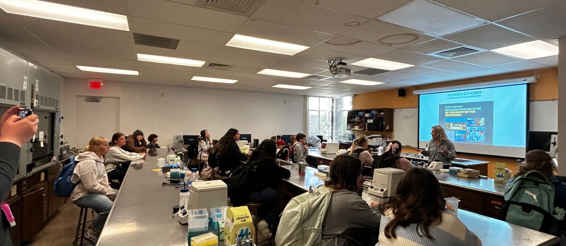 Amy presenting to students in class