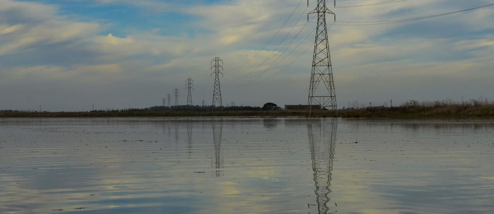 Image of transmission lines during a flood event