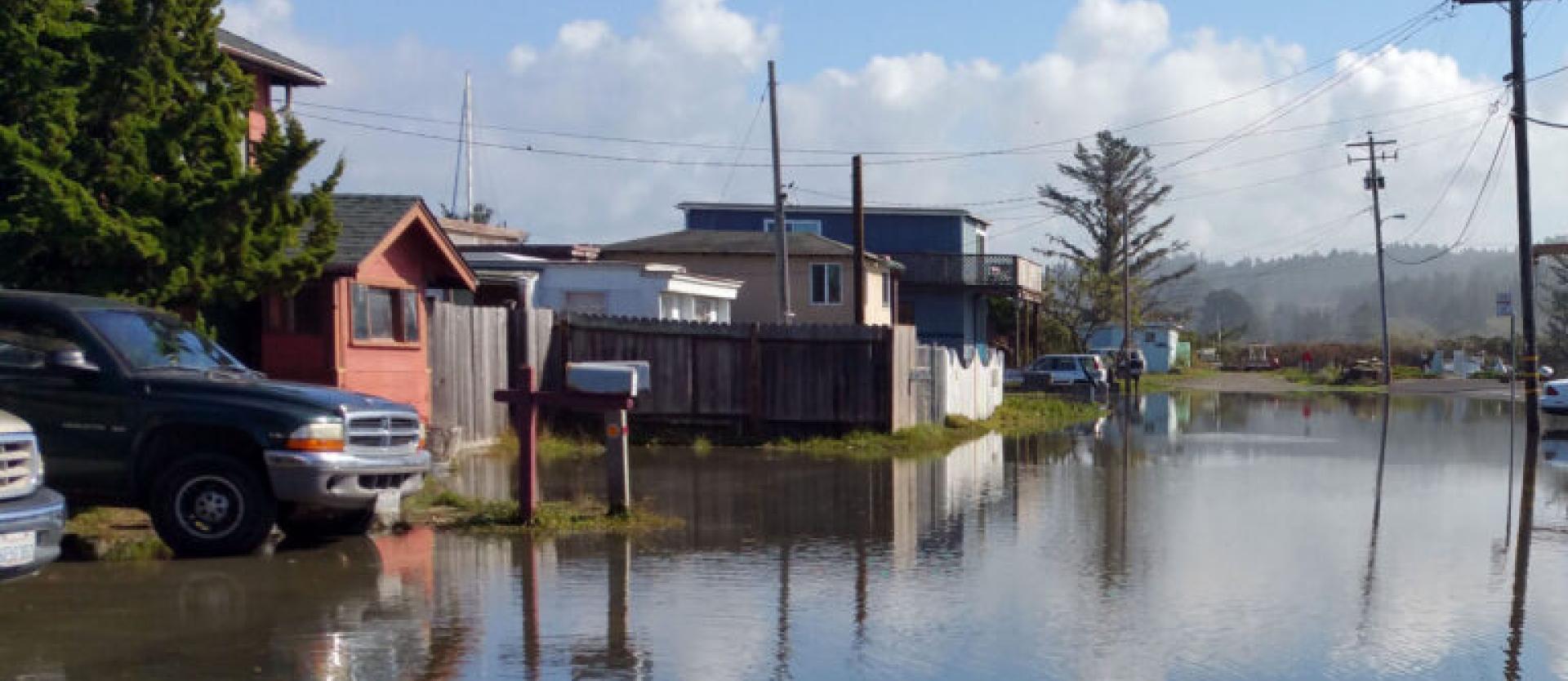 image of a street in King Salmon that is entirely flooded