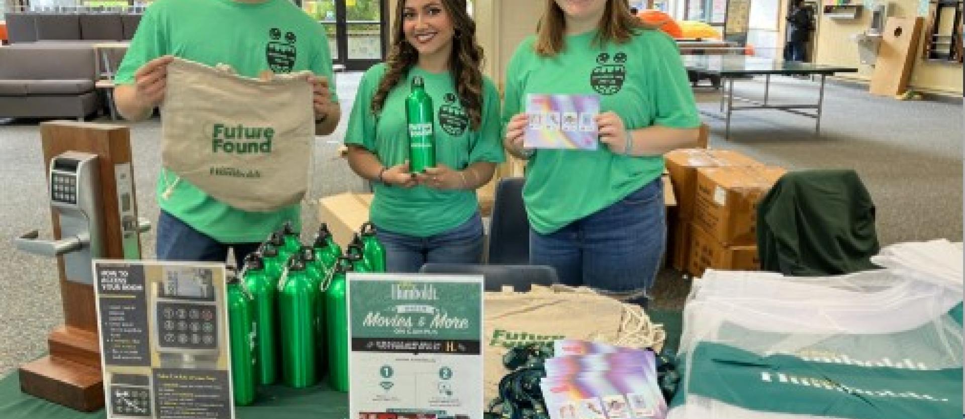 Orientation leaders giving away free items including generation conscious laundry detergent sheets