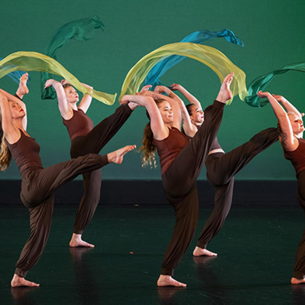Dancers with green scarves