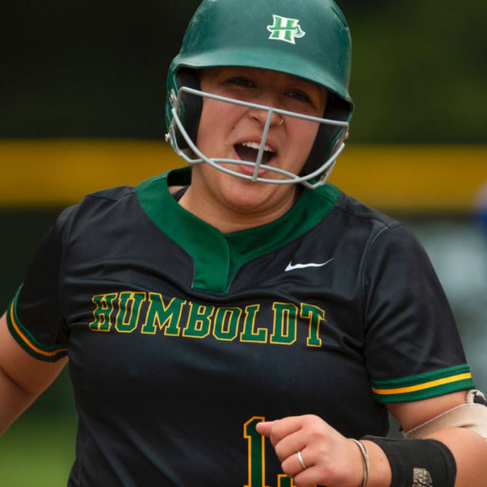 women playing softball