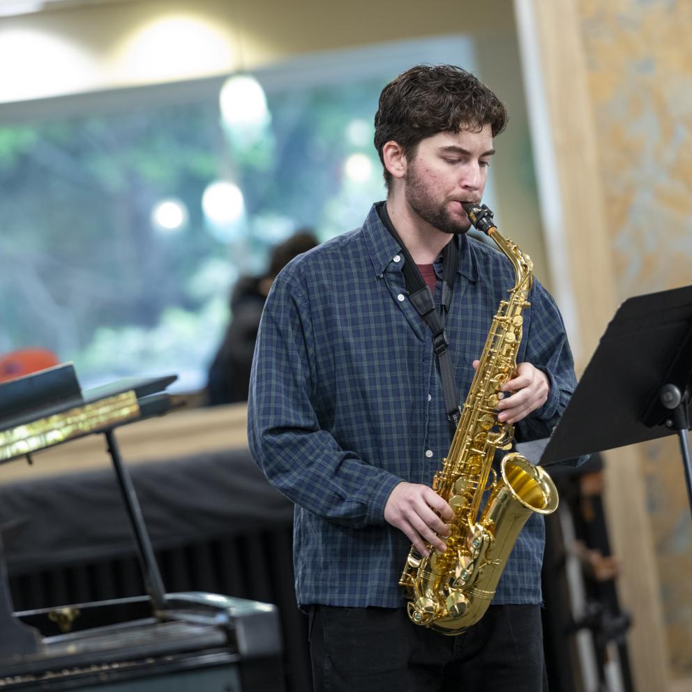 Student playing sax at ideafest