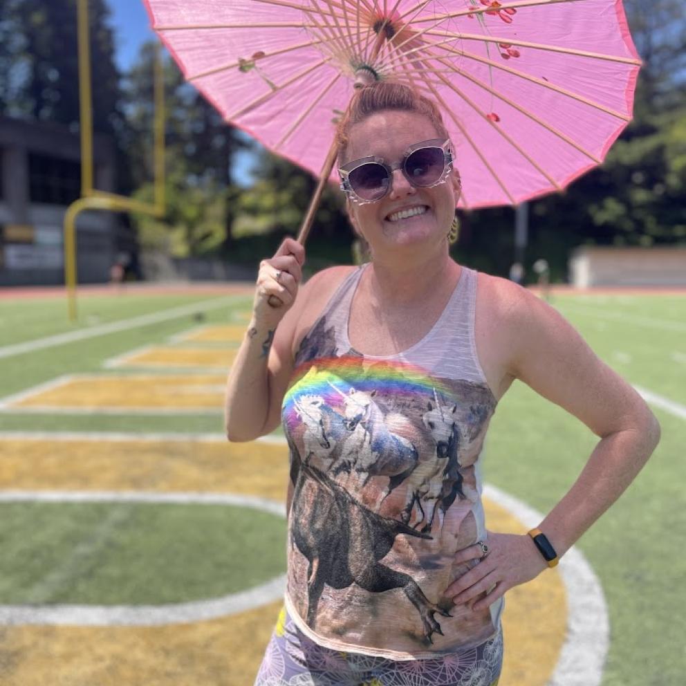 Photo of a person with a paper umbrella