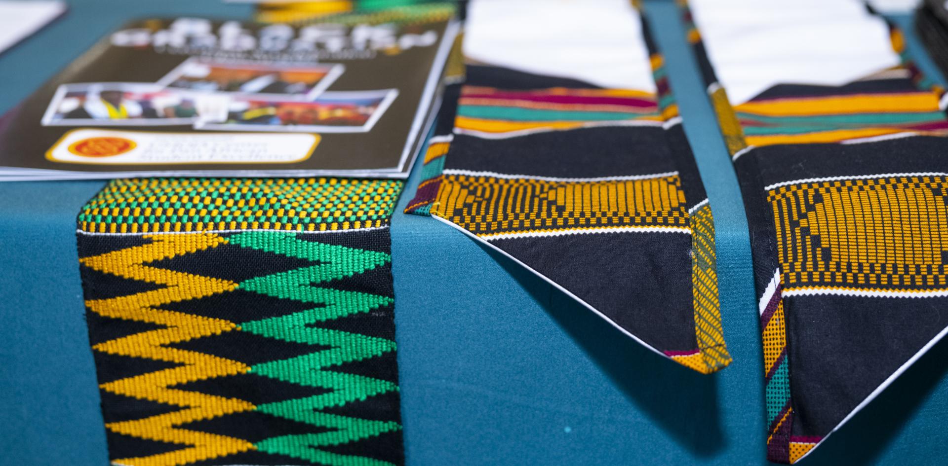 Close up of Black Graduation Sashes.