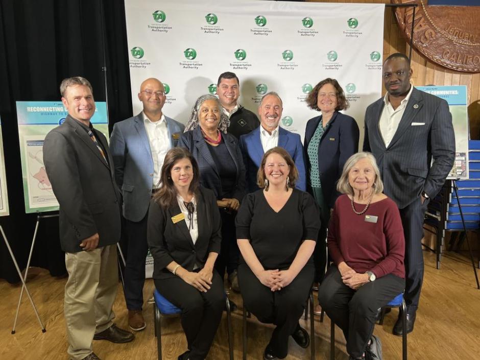 university and city leaders gathered to annoucement partnership 