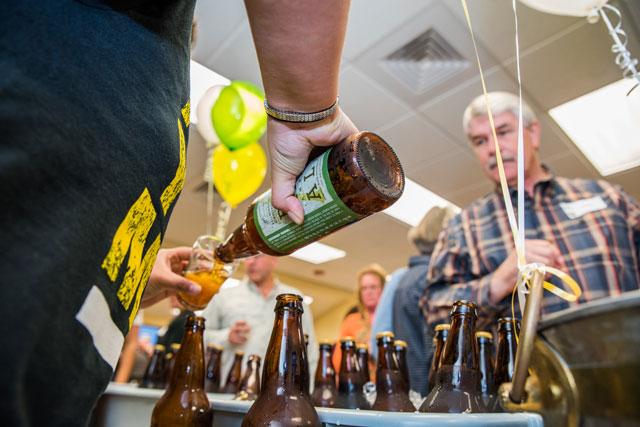A tour group samples beers at the Lost Coast Brewery. 
