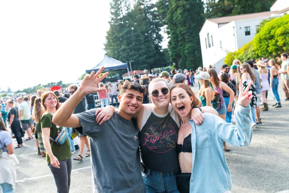Humboldt students are all smiles at the annual Lumberjack Weekend block party.