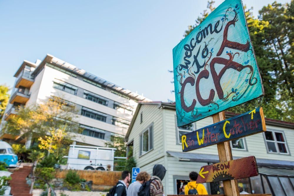 A photo of the CCAT sign in front of the Buck House 