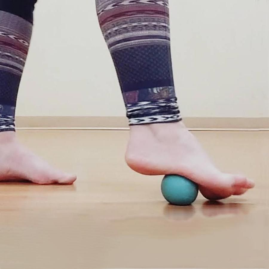 Foot on massage ball
