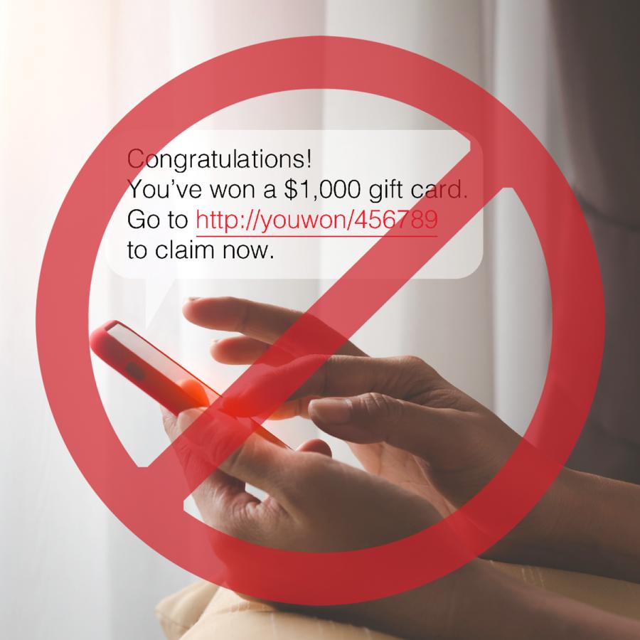 Circle-slash over person holding phone with spam message "Congratulations, you've won a $1,000 gift card..."