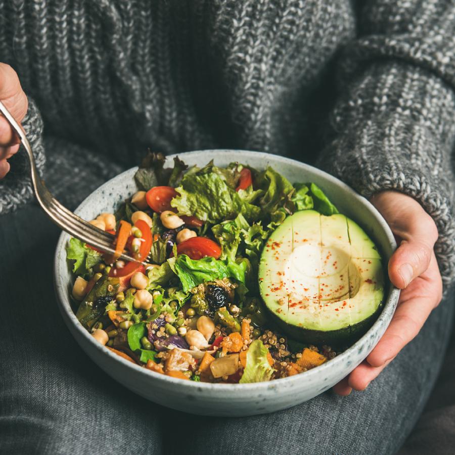 Person eating a healthy salad
