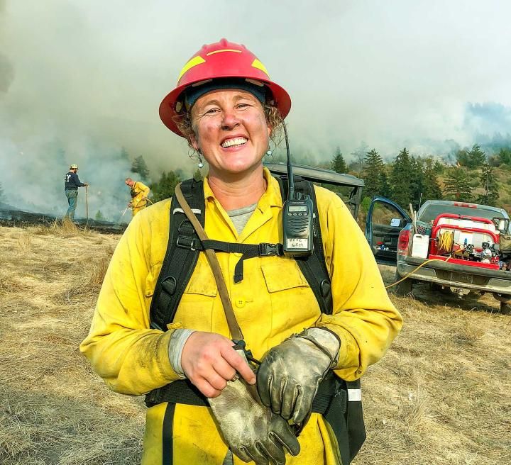 female fire fighter out in the field